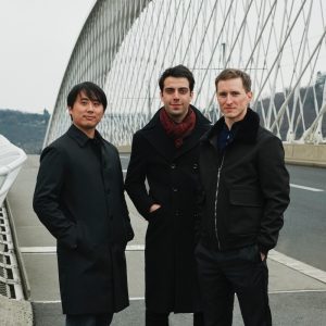 Trio Zimbalist standing on bridge